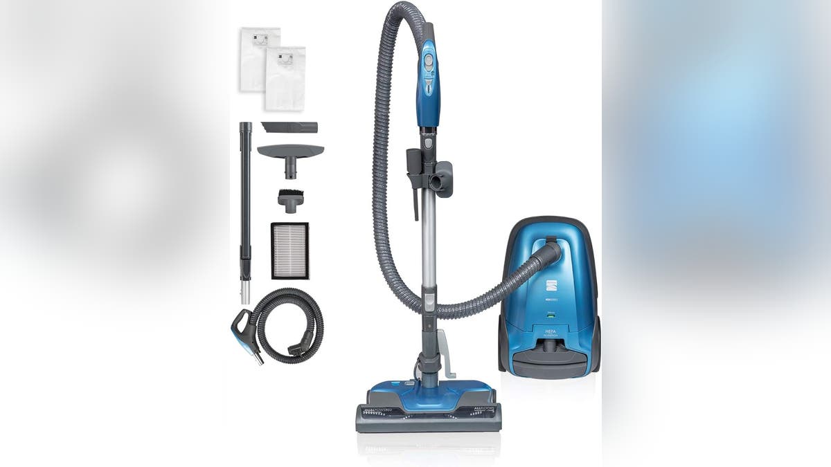 A vacuum with an extendable arm and HEPA filter.