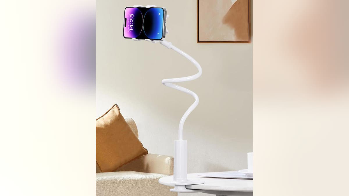 Watch your phone without having to hold it up with a bedside table clip. 