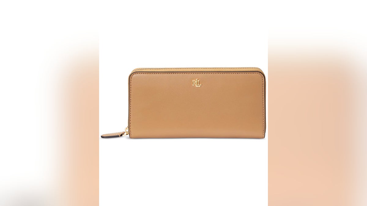 If she has a lot to stash, this Ralph Lauren leather wallet features a secure zip-around closure that keeps essentials safe and organized.