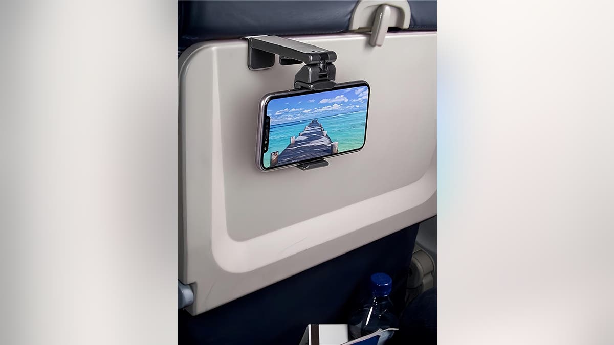 Make traveling more comfortable with an airplane phone holder. 