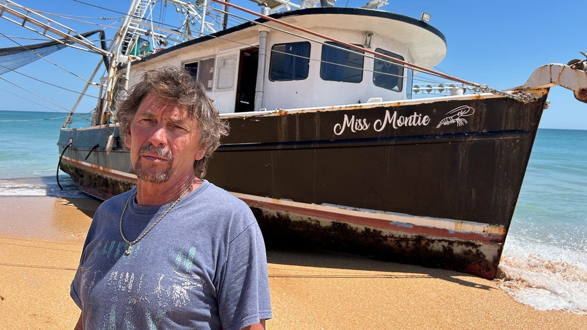A shrimp boat washed ashore on a Florida beach on Sunday