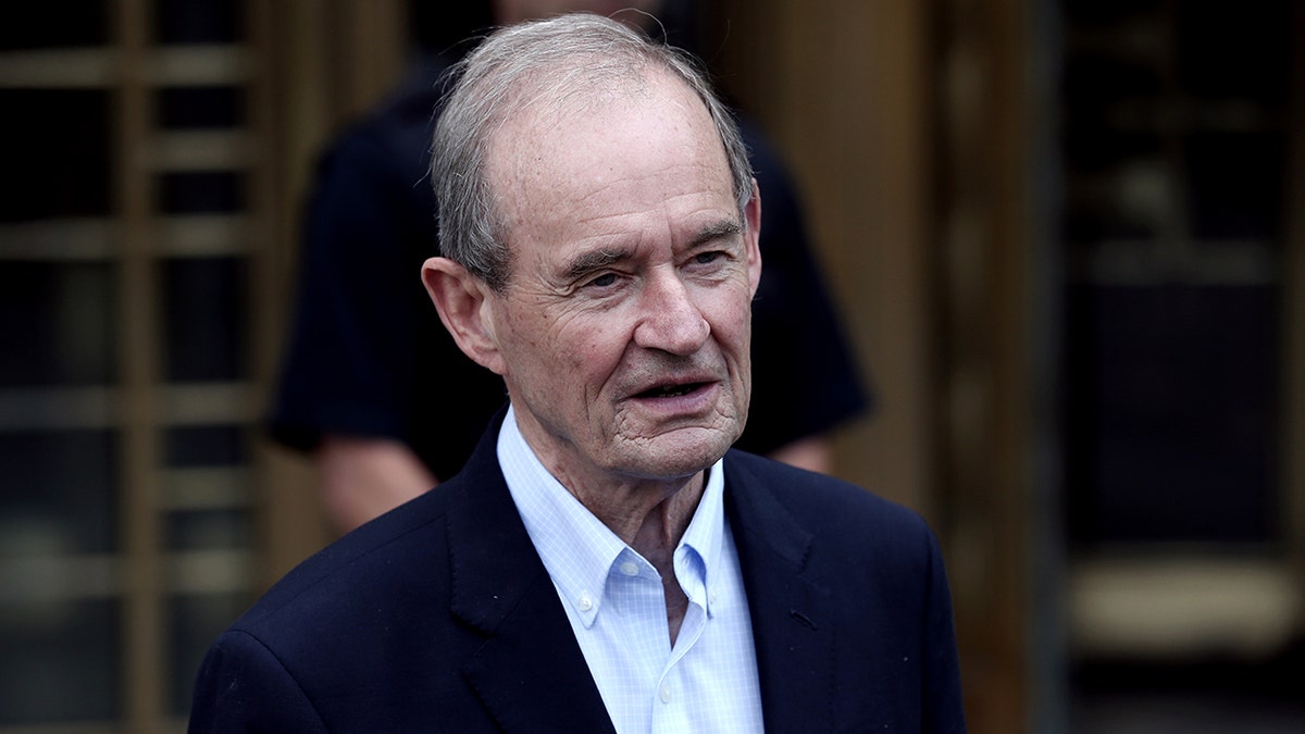 A close-up of attorney David Boies in a dark blue suit and a white shirt.