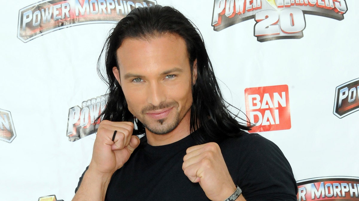 His fist smiles in the close-up of a smiling Ricardo Medina Jr.
