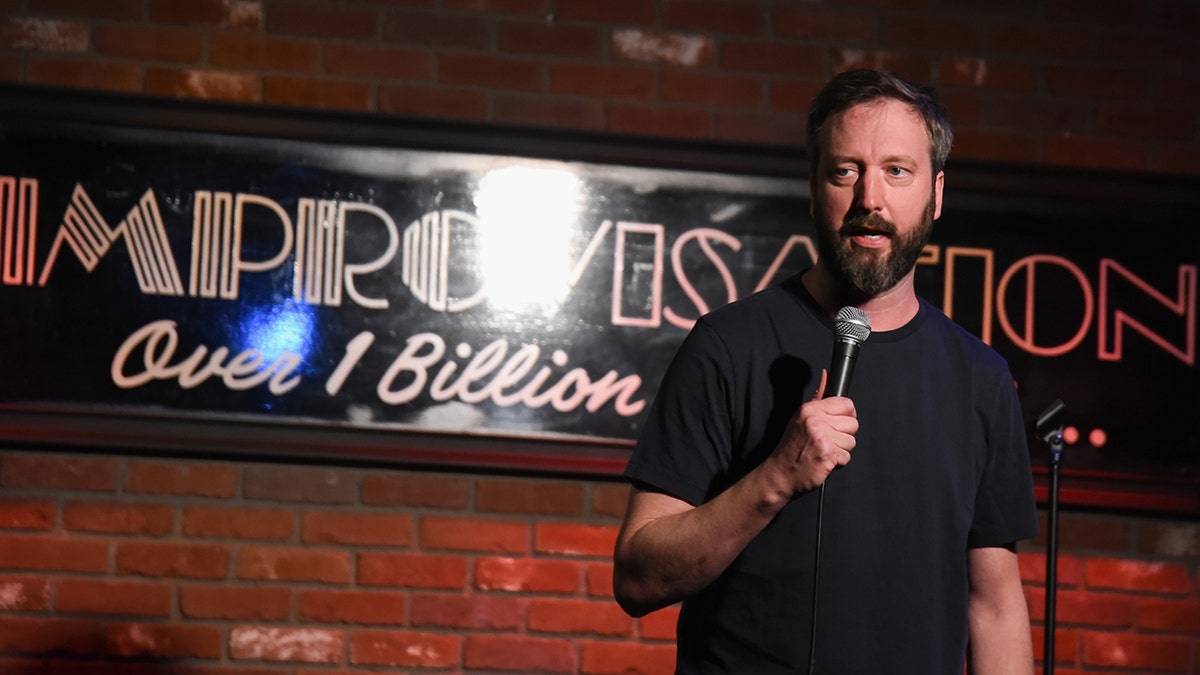 Tom Green doing improv on stage.