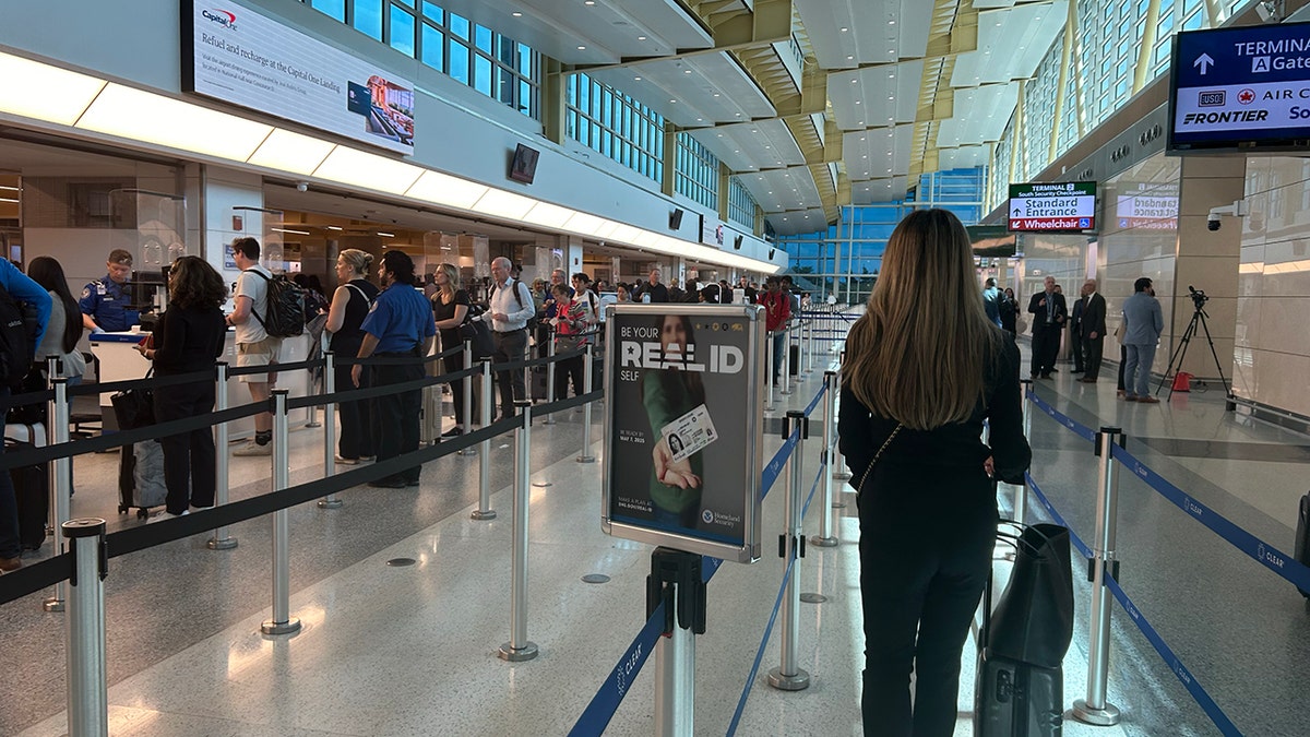 A real identity mark in Wideshot from an airport full of people.
