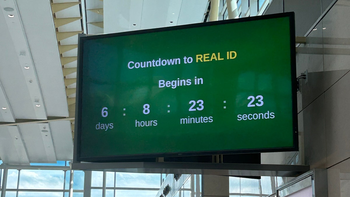 The countdown screen against a green background. There is a big address over the countdown hour he says "The countdown to Real Id begins:"