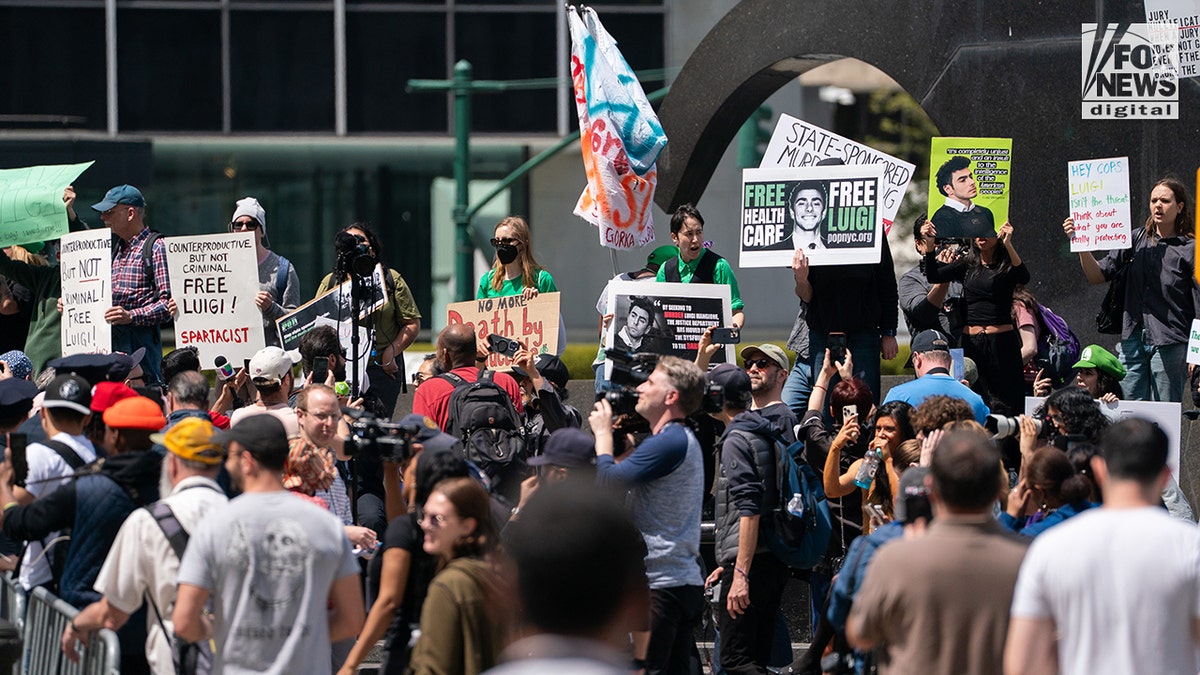 Luigi Mangione faces a potential death penalty as crowds of supporters stand up for him outside of federal court