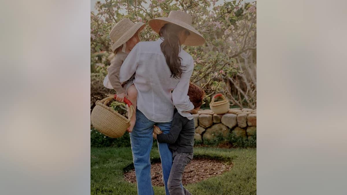 Markle with her kids in her garden