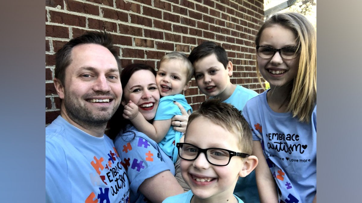Oliver "Ollie" Stratton along with his family in a selfie