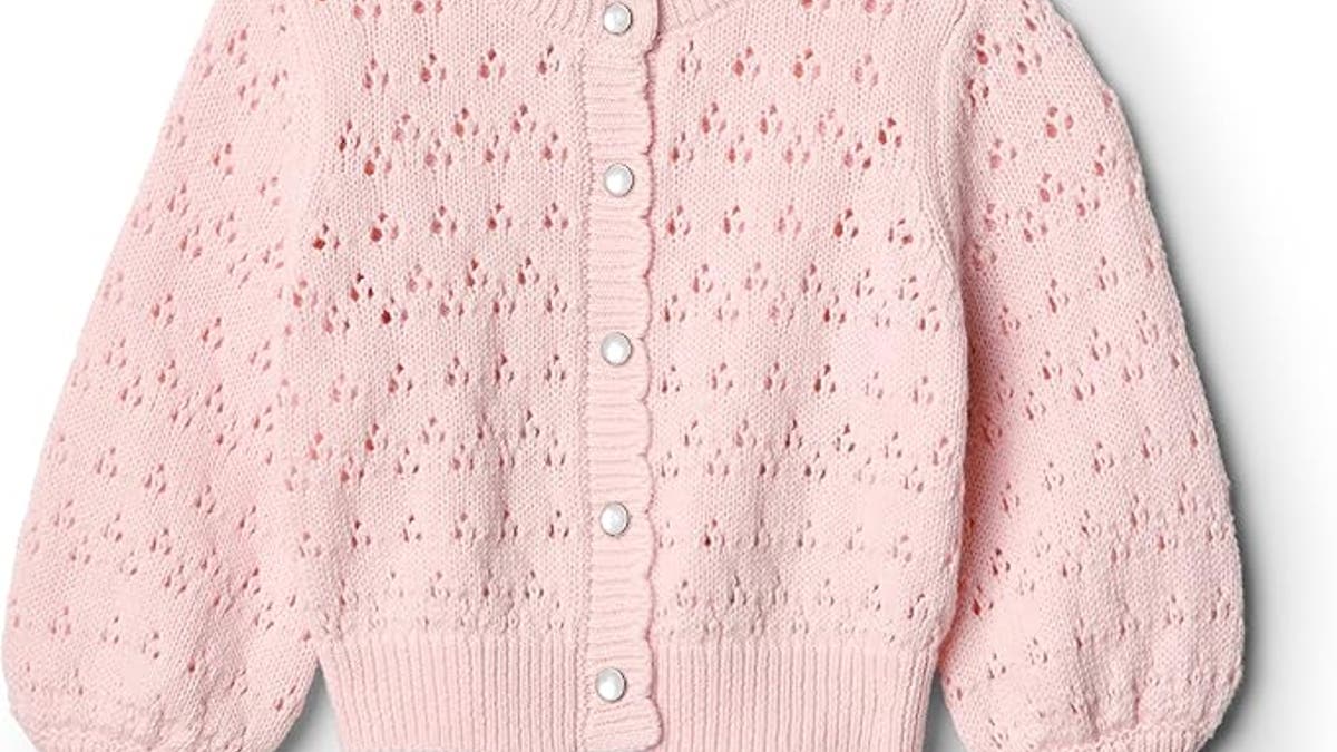 This saccharine pointelle cardigan is cleanable for outpouring days.