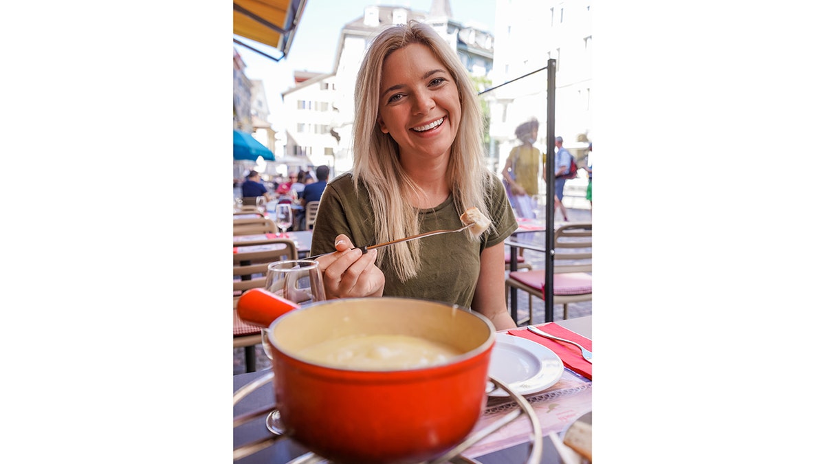 emily eats fondue in switzerland
