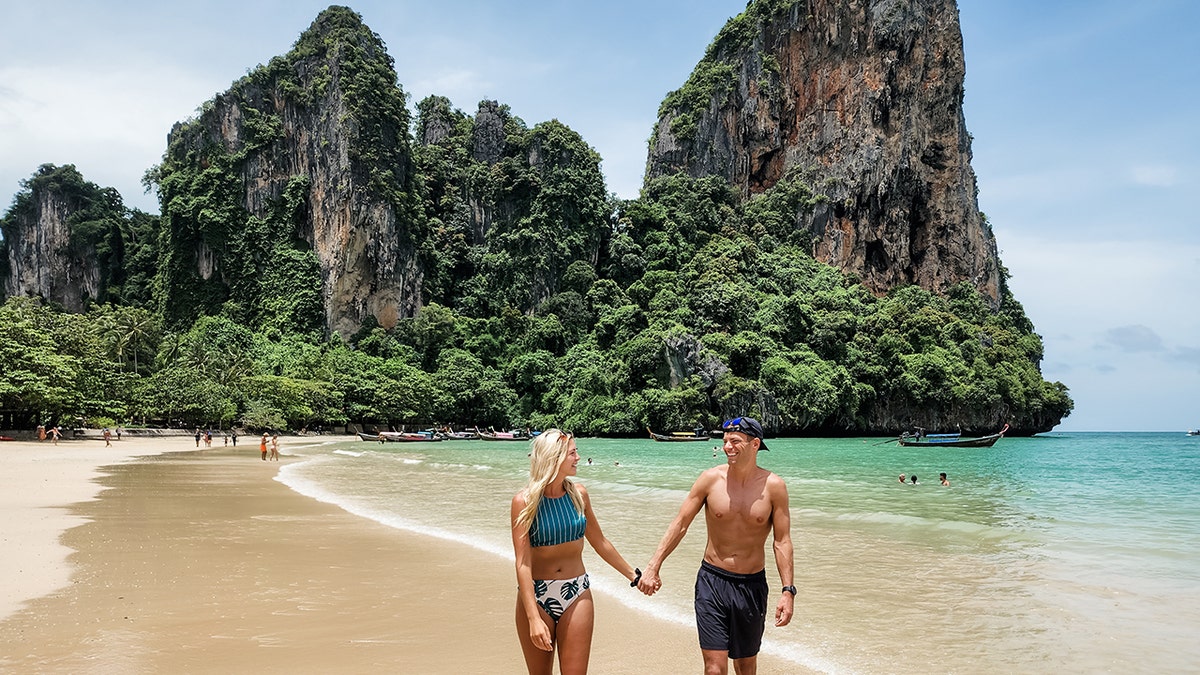 hudson and emily crider on a thailand beach