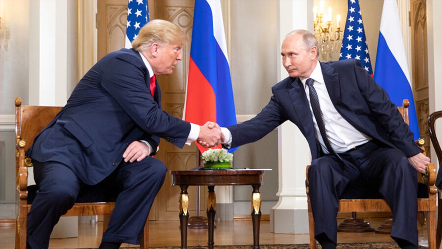 putin trump shake hands