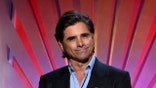 John Stamos wears blue suit and shirt