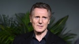 Close up of a serious Liam Neeson