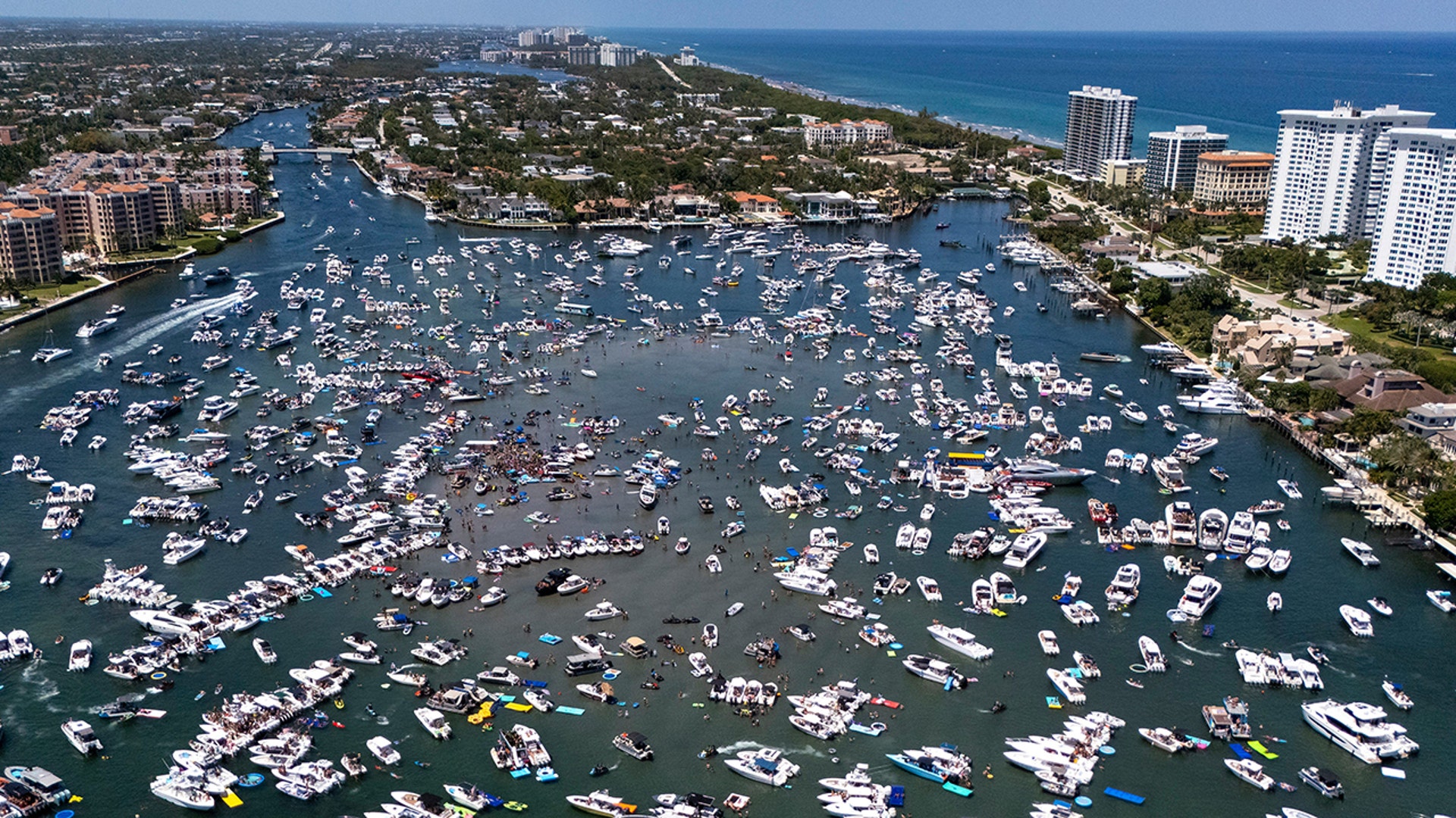 Spring breakers crowd lake in Florida.