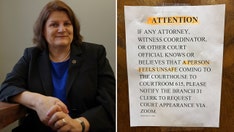 Photo shows Milwaukee judge's courtroom door with notice to anyone who 'feels unsafe'