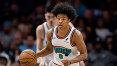 Grizzlies’ Jaylen Wells stretchered off court after falling on head due to hard foul by Hornets player