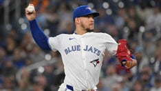 Blue Jays' Jose Berrios confronts Mariners' Cal Raleigh who he believed was stealing his signs