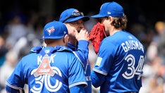Blue Jays' Kevin Gausman slips down stairs following ejection from abysmal game