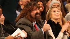 WWE legend Mick Foley walks away from scary car wreck with minor injuries, concussion