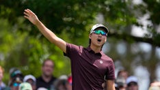 Masters officials penalize golfer over ball move