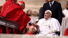 Pope Francis makes appearance after Palm Sunday mass at the Vatican