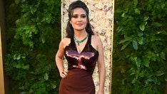 Sports Illustrated cover model Salma Hayek admits she tried to 'back out' of racy photo shoot