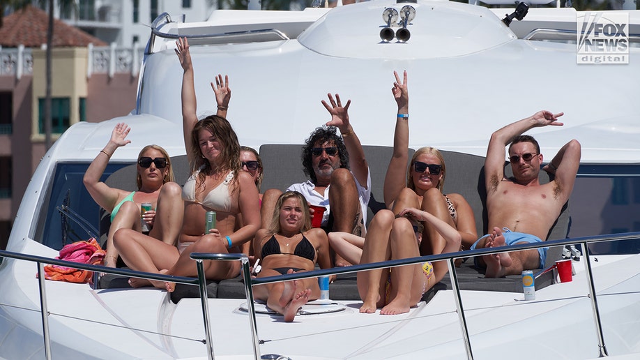 Women in bikinis celebrate spring break in Florida.