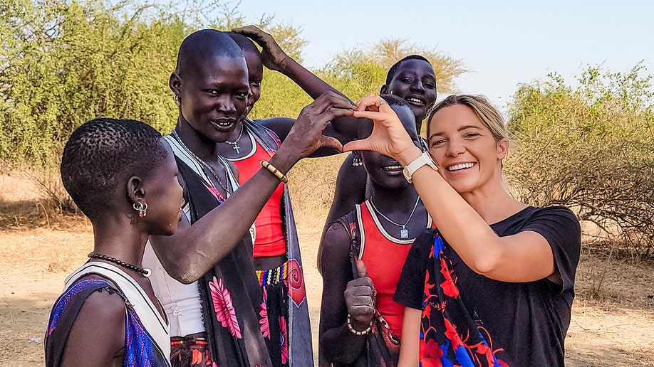 Emily Crider with locals in South Sudan