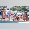 Women in bikinis celebrate spring break in Florida.