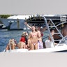 Women in bikinis celebrate spring break in Florida.