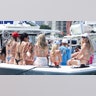 Women in bikinis celebrate spring break in Florida.
