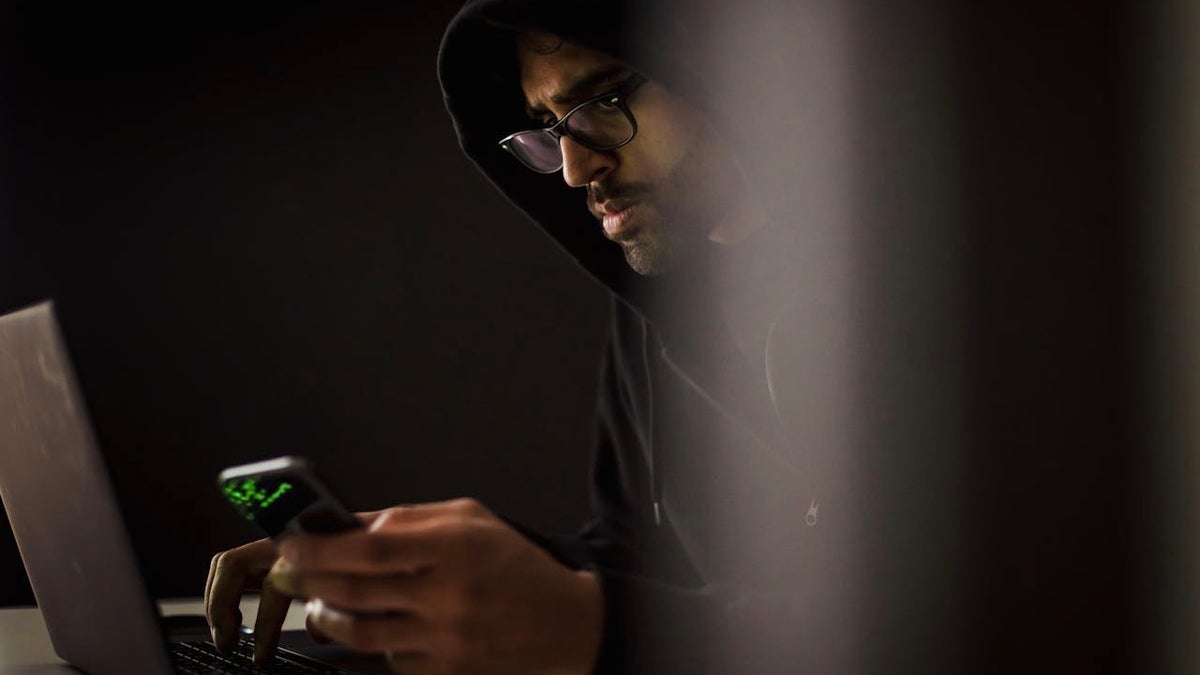hacker at laptop