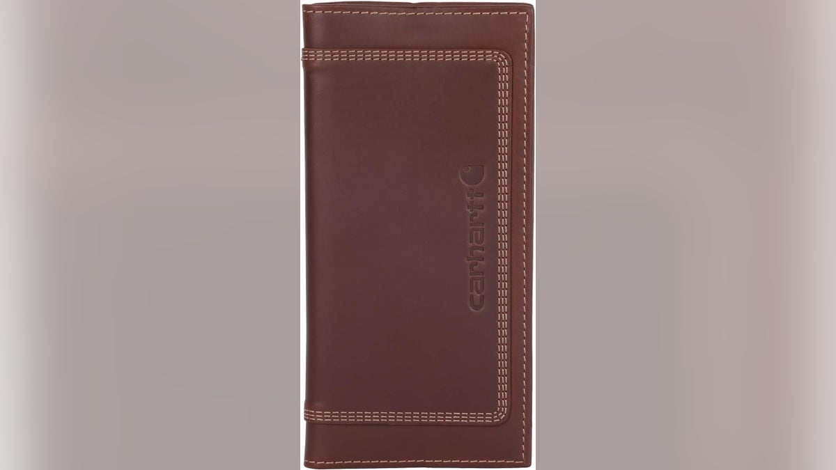 Hold a checkbook in Carhartt’s signature leather wallet.