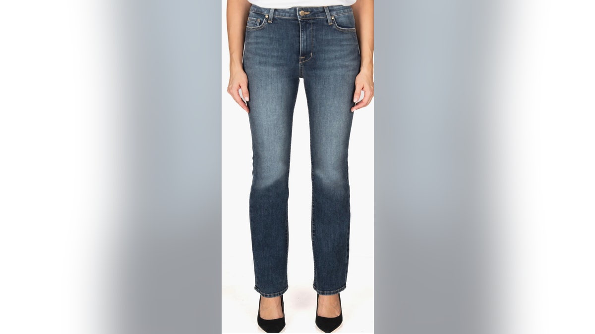 A brace of jeans connected a model's legs