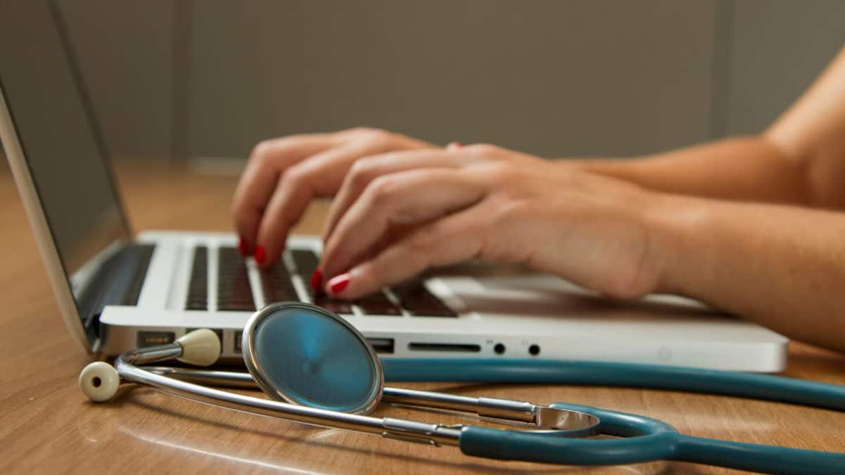 health attraction worker connected laptop