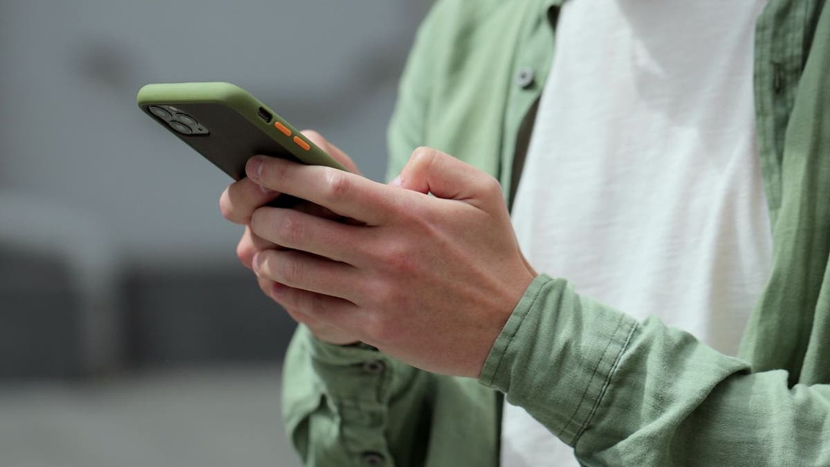 man texting