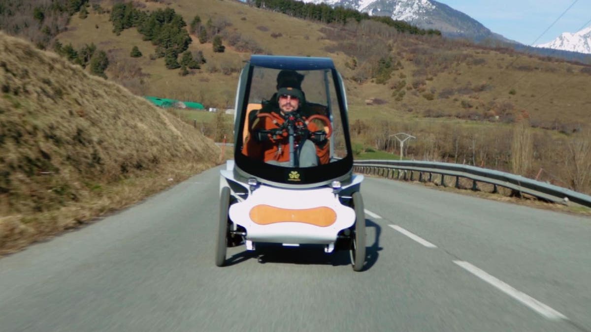 Four-wheeled electric vehicle.