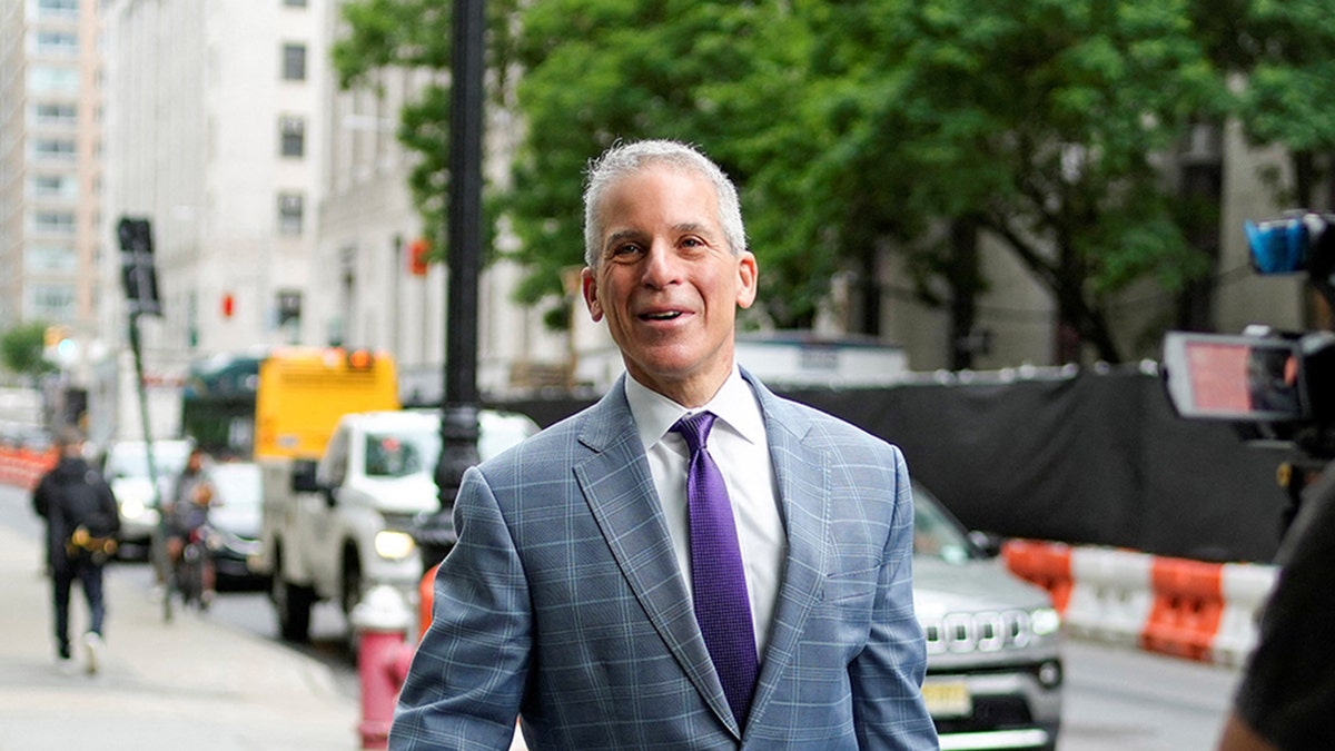 P. Diddy's lawyer arrives to court for his trial.
