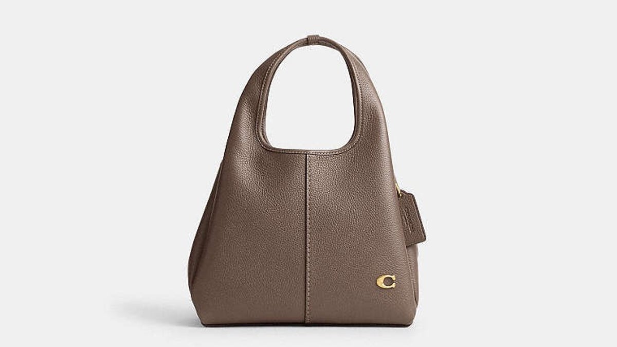 A brown COACH leather Lana 23 bag