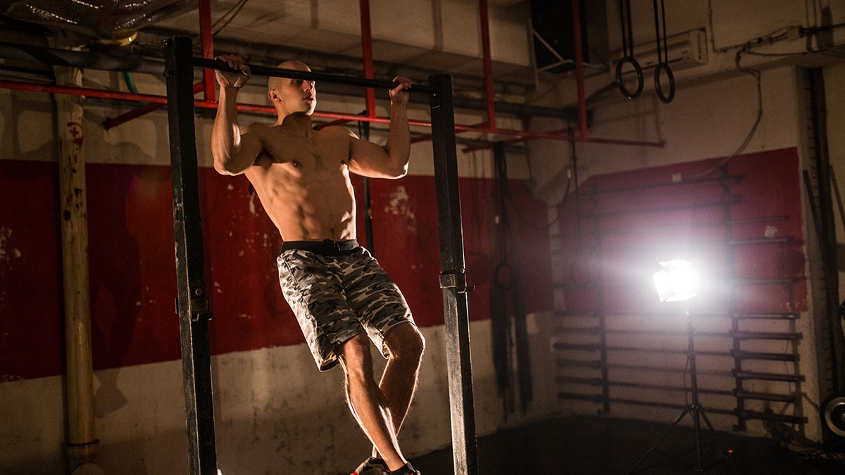 man doing pull-ups