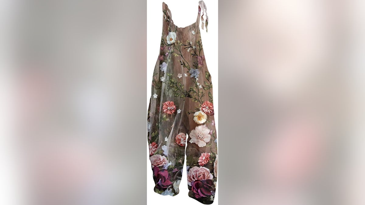 Fun overalls offer a relaxed fit with a vibrant floral print