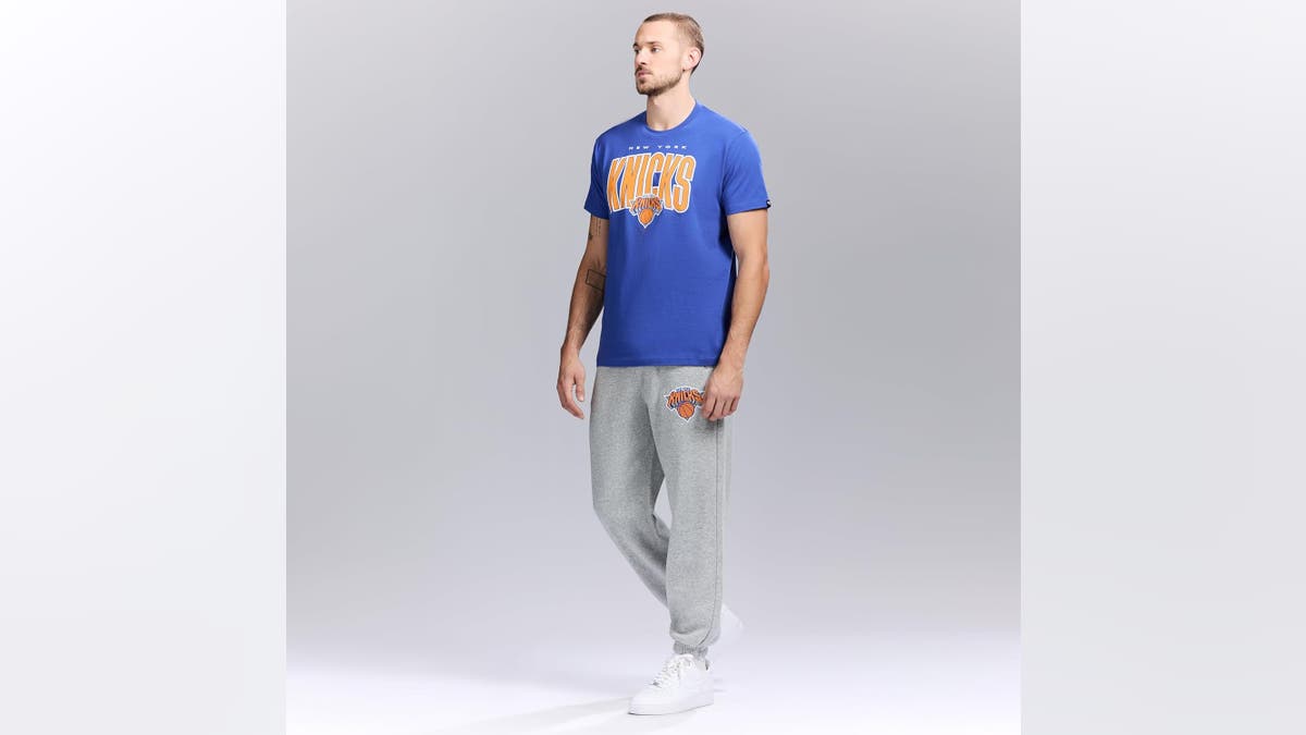 A Knicks blue t-shirt is made from 100% cotton. 