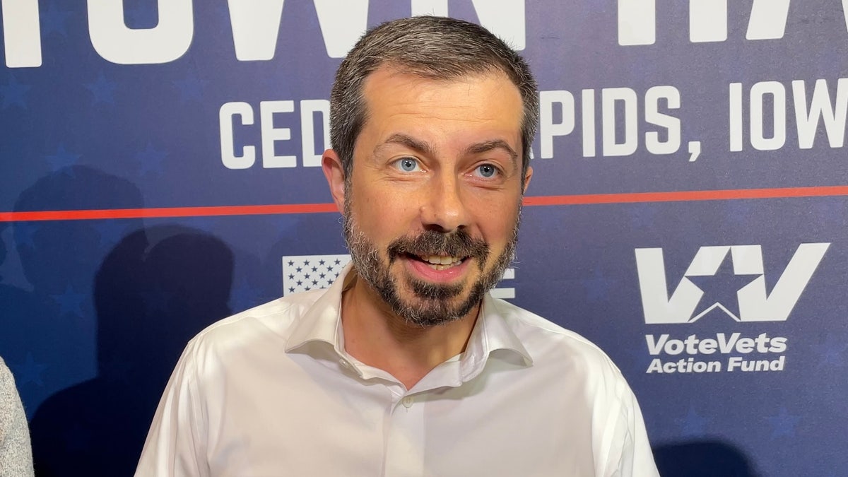 Former Transportation Secy. Pete Buttigieg speaks with reporters after holding a town hall in Cedar Rapids, Iowa, on May 13. 2025.