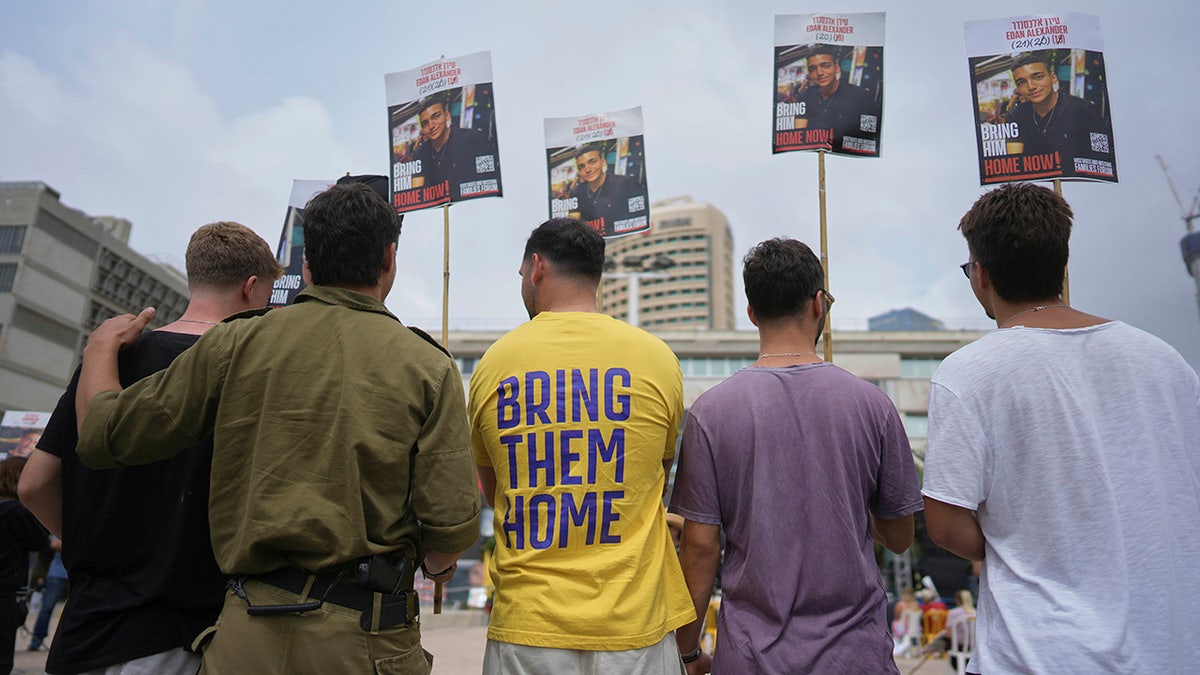 Israelis gather in Tel Aviv to watch release of Edan Alexander