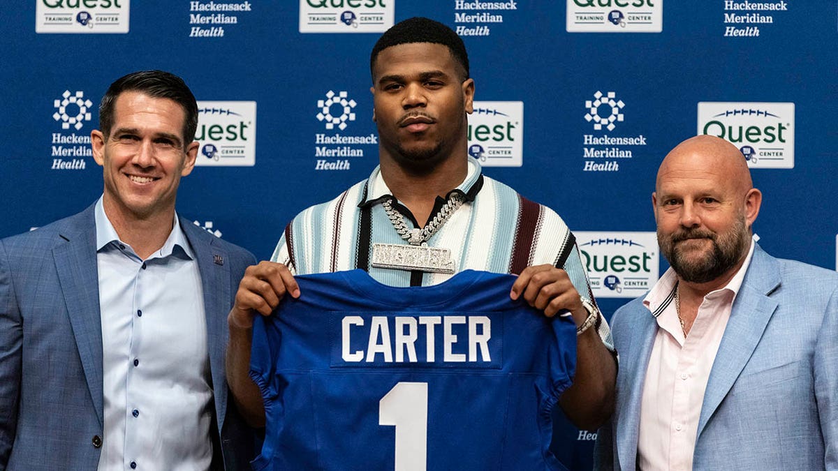 Abdul Carter with the Giants' brass