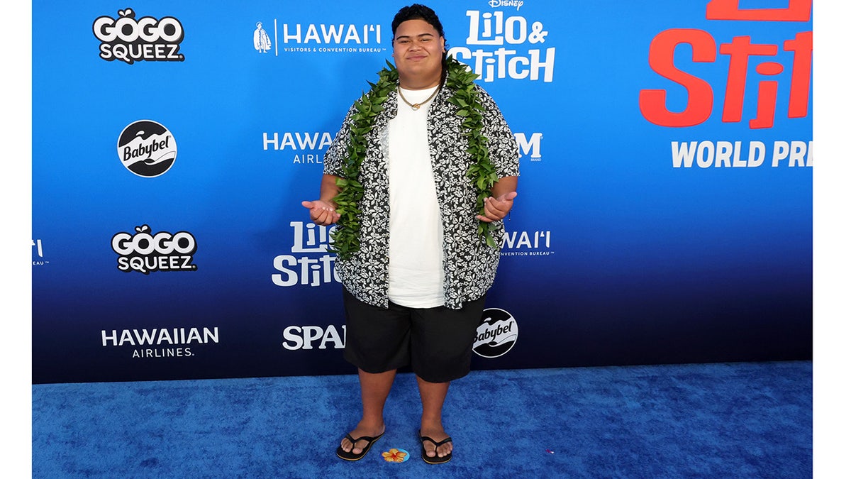 American Idol winner walks red carpet at Lilo & Stitch world premiere.