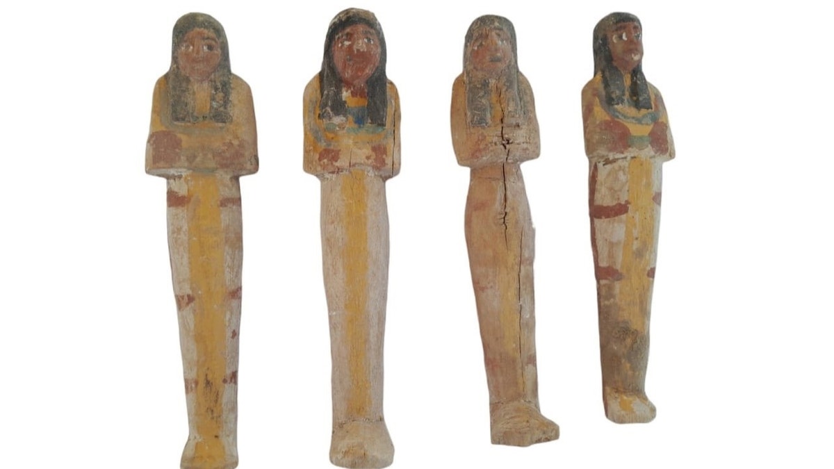 Egyptian coffins lined up next to each other