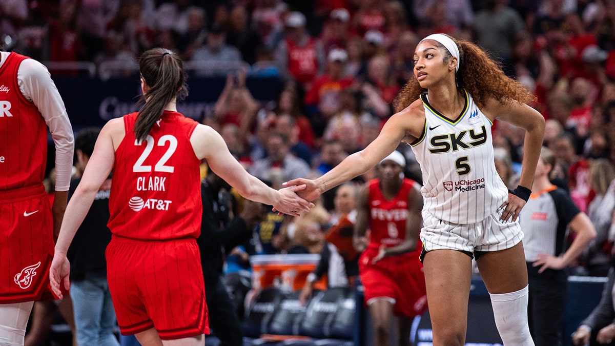 Angel Reese and Caitlin Clark shake hands